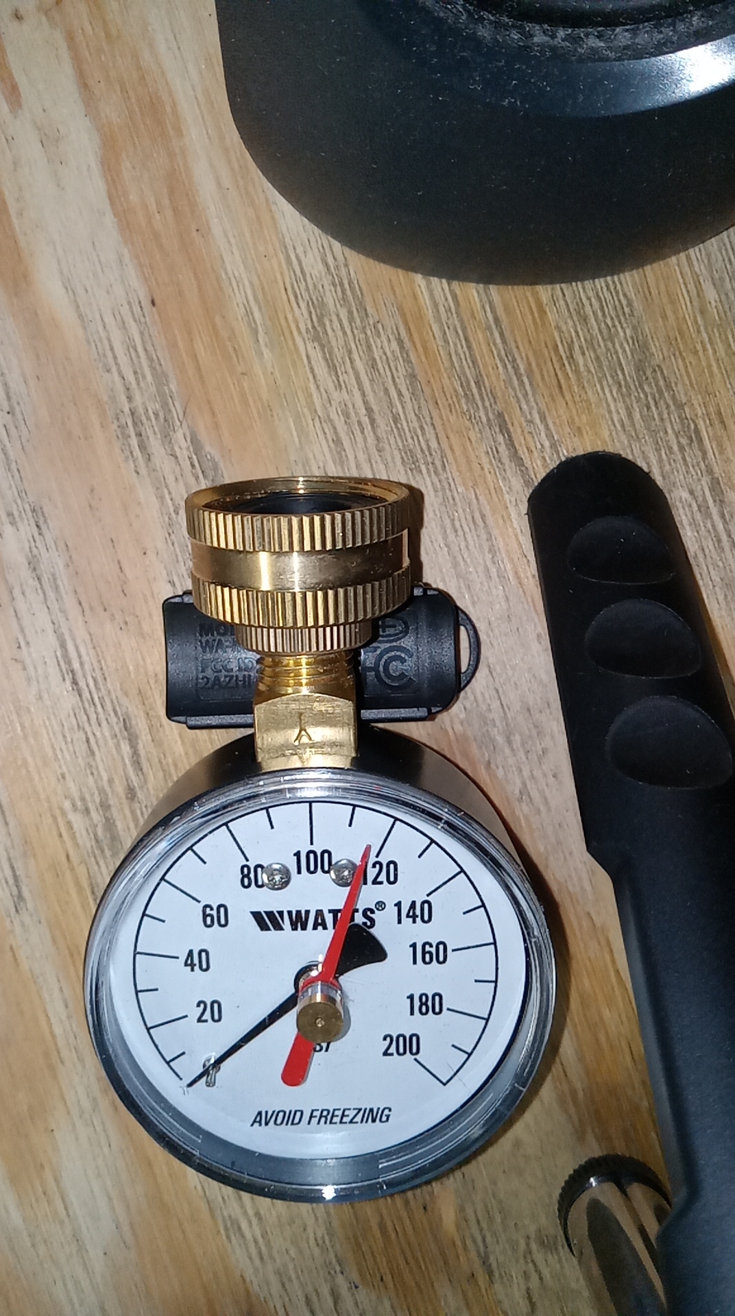 Watts water pressure gauge used during leak inspection